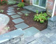 Patio with seating wall and water feature 5